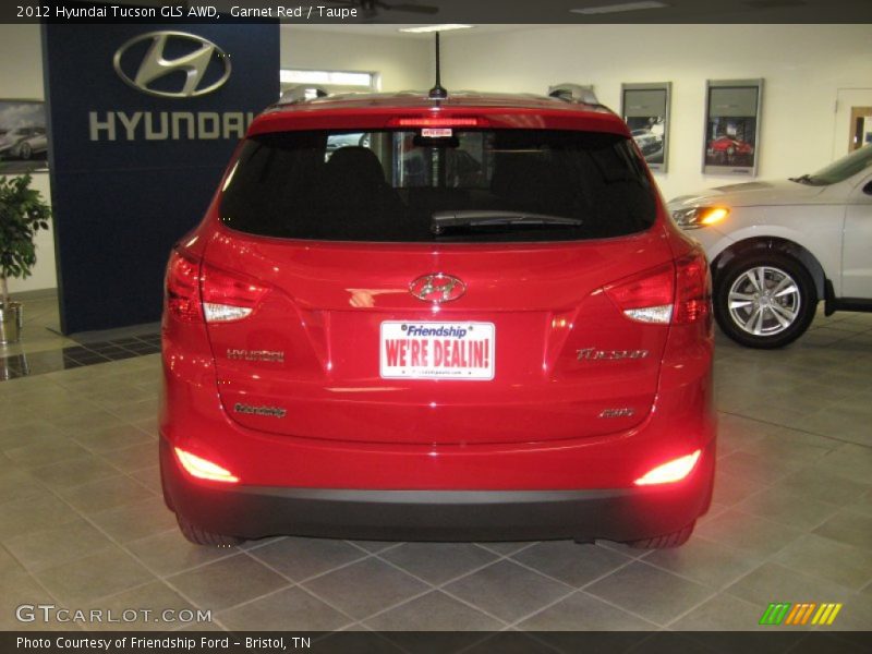 Garnet Red / Taupe 2012 Hyundai Tucson GLS AWD