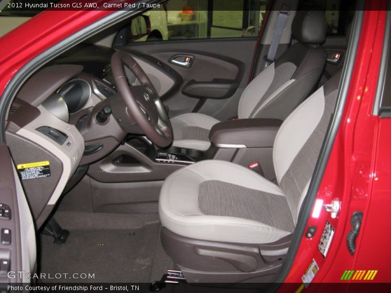 Garnet Red / Taupe 2012 Hyundai Tucson GLS AWD