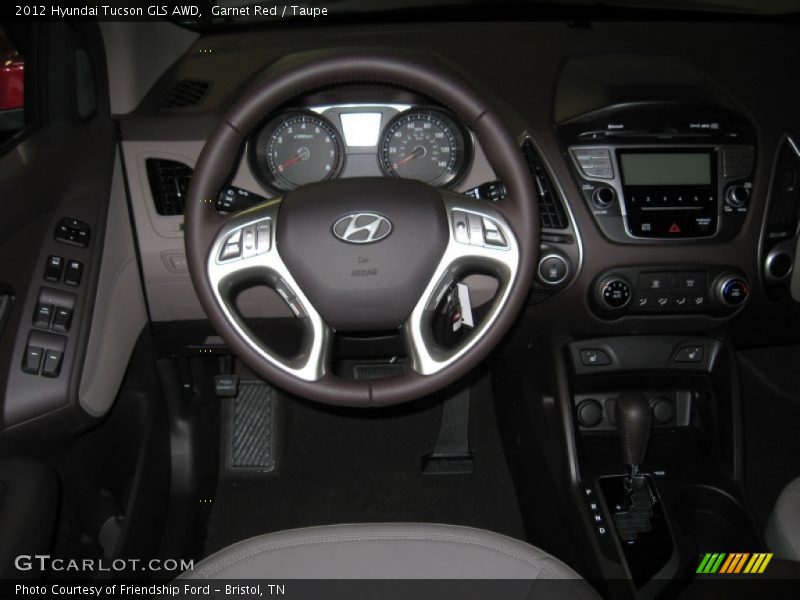 Garnet Red / Taupe 2012 Hyundai Tucson GLS AWD