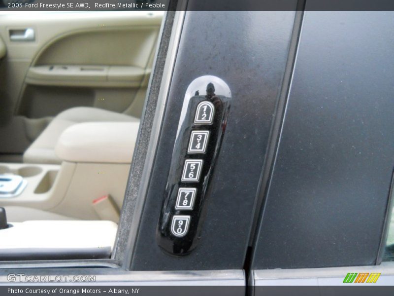 Redfire Metallic / Pebble 2005 Ford Freestyle SE AWD