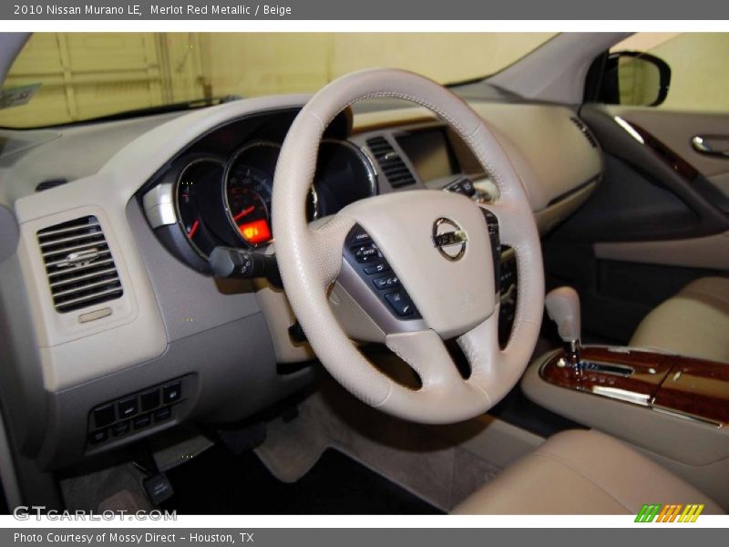 Merlot Red Metallic / Beige 2010 Nissan Murano LE