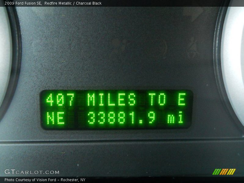 Redfire Metallic / Charcoal Black 2009 Ford Fusion SE
