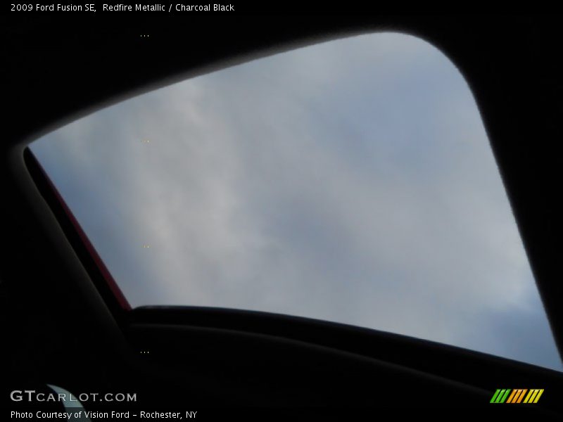 Redfire Metallic / Charcoal Black 2009 Ford Fusion SE