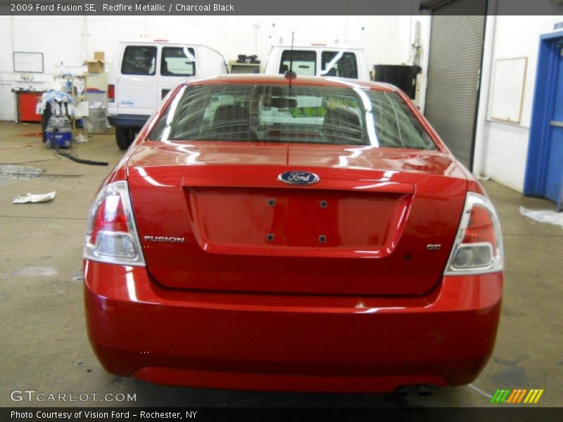 Redfire Metallic / Charcoal Black 2009 Ford Fusion SE