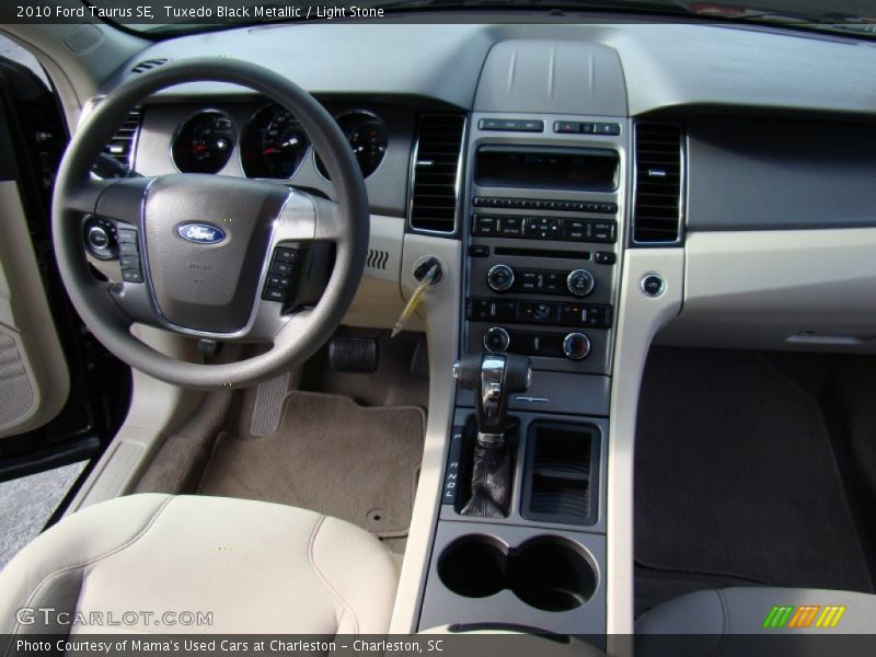 Tuxedo Black Metallic / Light Stone 2010 Ford Taurus SE