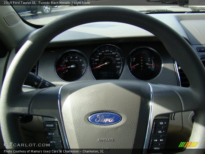Tuxedo Black Metallic / Light Stone 2010 Ford Taurus SE