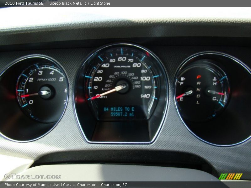 Tuxedo Black Metallic / Light Stone 2010 Ford Taurus SE