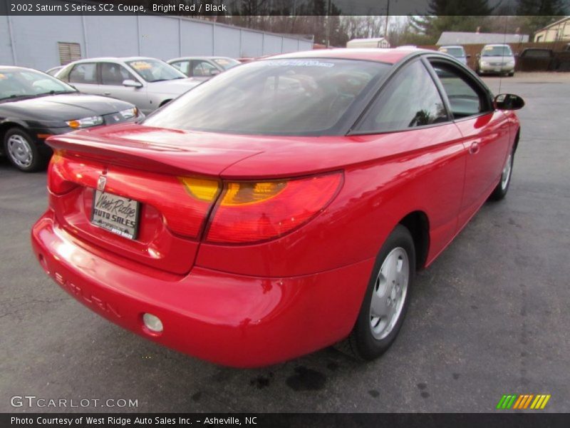 Bright Red / Black 2002 Saturn S Series SC2 Coupe