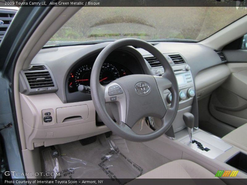 Aloe Green Metallic / Bisque 2009 Toyota Camry LE
