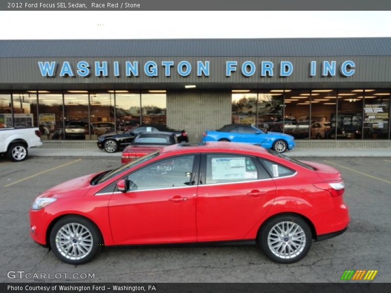 Race Red / Stone 2012 Ford Focus SEL Sedan