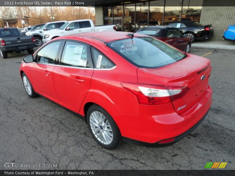 Race Red / Stone 2012 Ford Focus SEL Sedan