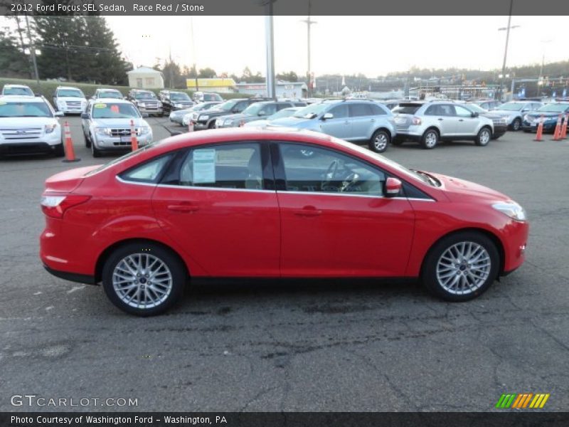 Race Red / Stone 2012 Ford Focus SEL Sedan