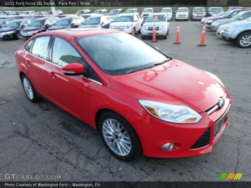Race Red / Stone 2012 Ford Focus SEL Sedan