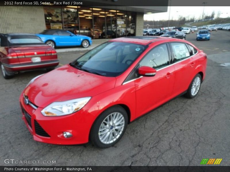 Race Red / Stone 2012 Ford Focus SEL Sedan