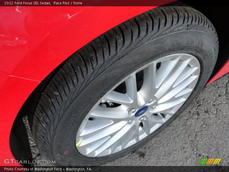 Race Red / Stone 2012 Ford Focus SEL Sedan