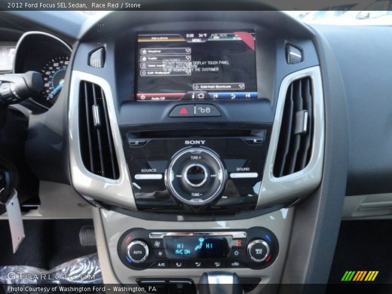 Race Red / Stone 2012 Ford Focus SEL Sedan