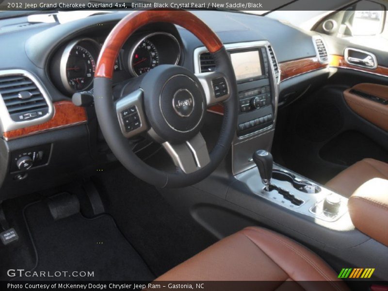 Brilliant Black Crystal Pearl / New Saddle/Black 2012 Jeep Grand Cherokee Overland 4x4