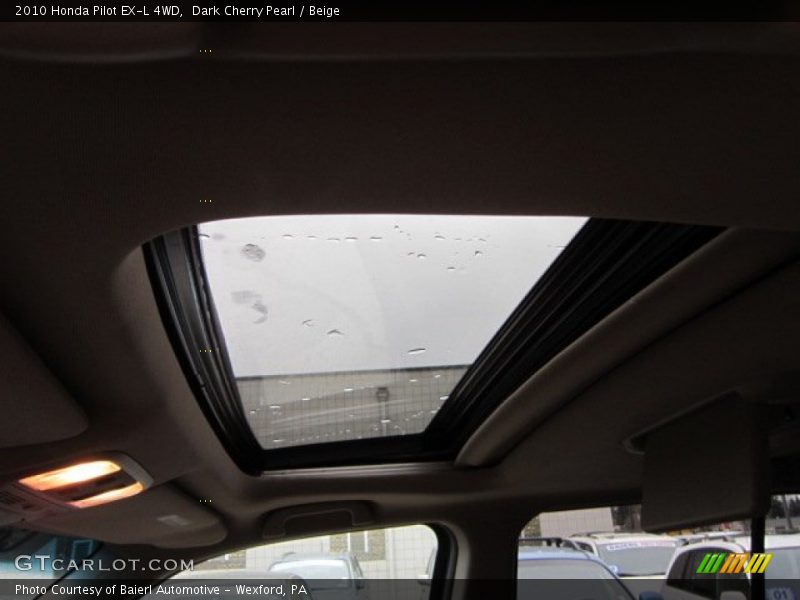 Dark Cherry Pearl / Beige 2010 Honda Pilot EX-L 4WD