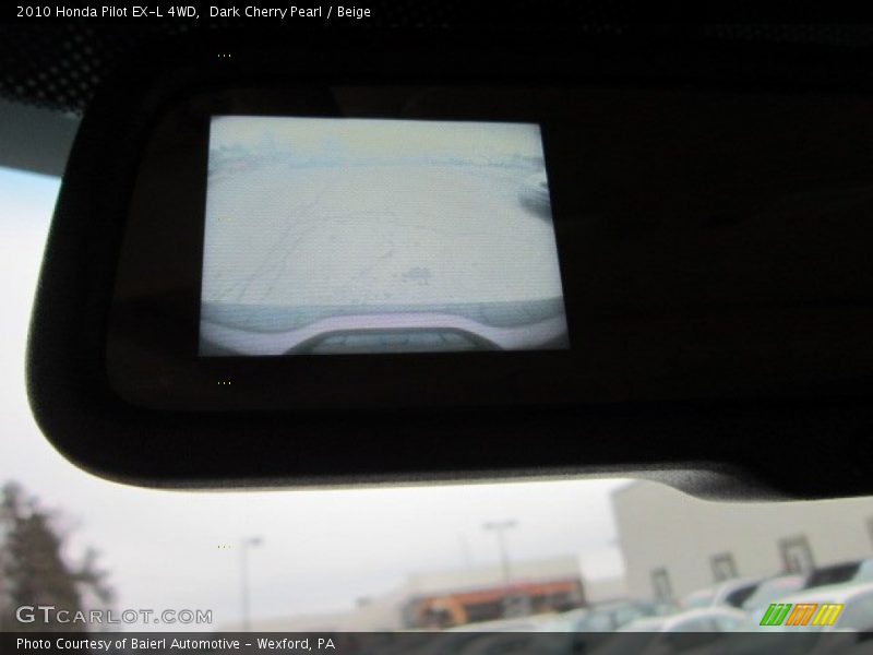 Dark Cherry Pearl / Beige 2010 Honda Pilot EX-L 4WD