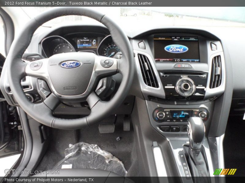 Tuxedo Black Metallic / Charcoal Black Leather 2012 Ford Focus Titanium 5-Door