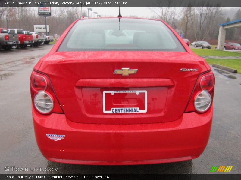 Victory Red / Jet Black/Dark Titanium 2012 Chevrolet Sonic LS Sedan