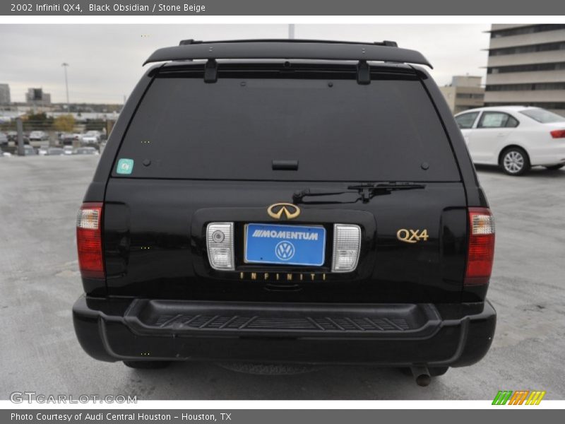 Black Obsidian / Stone Beige 2002 Infiniti QX4