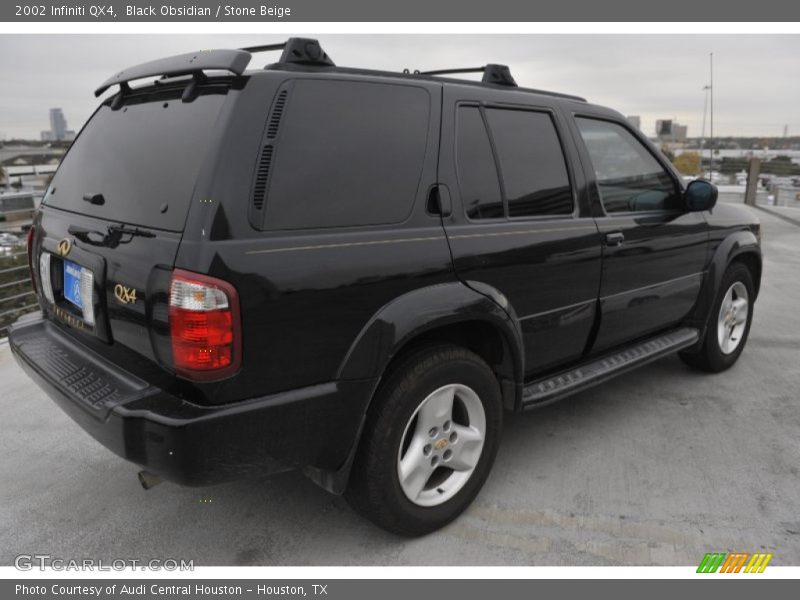 Black Obsidian / Stone Beige 2002 Infiniti QX4