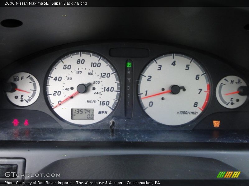 Super Black / Blond 2000 Nissan Maxima SE