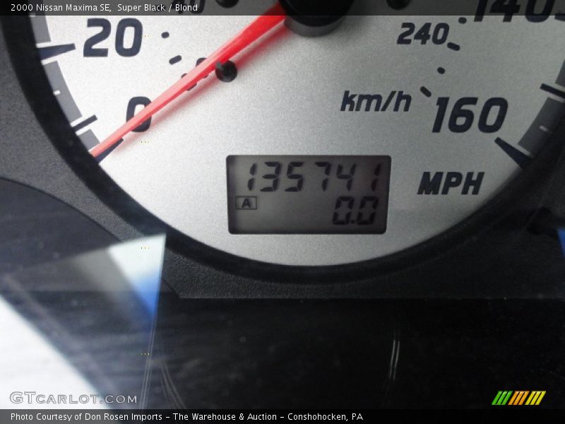 Super Black / Blond 2000 Nissan Maxima SE