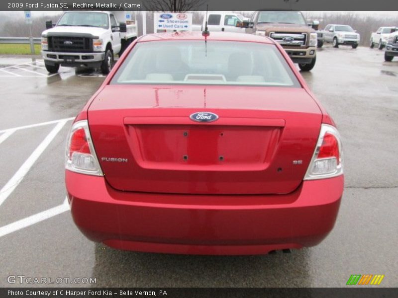Redfire Metallic / Camel 2009 Ford Fusion SE