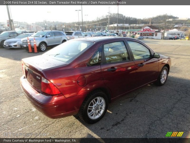 Dark Toreador Red Metallic / Dark Pebble/Light Pebble 2006 Ford Focus ZX4 SE Sedan