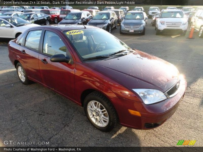 Dark Toreador Red Metallic / Dark Pebble/Light Pebble 2006 Ford Focus ZX4 SE Sedan