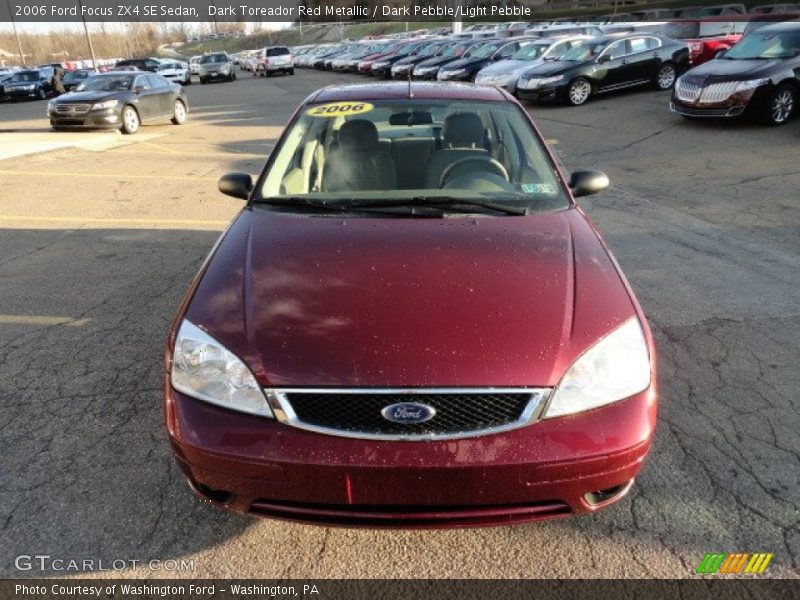 Dark Toreador Red Metallic / Dark Pebble/Light Pebble 2006 Ford Focus ZX4 SE Sedan