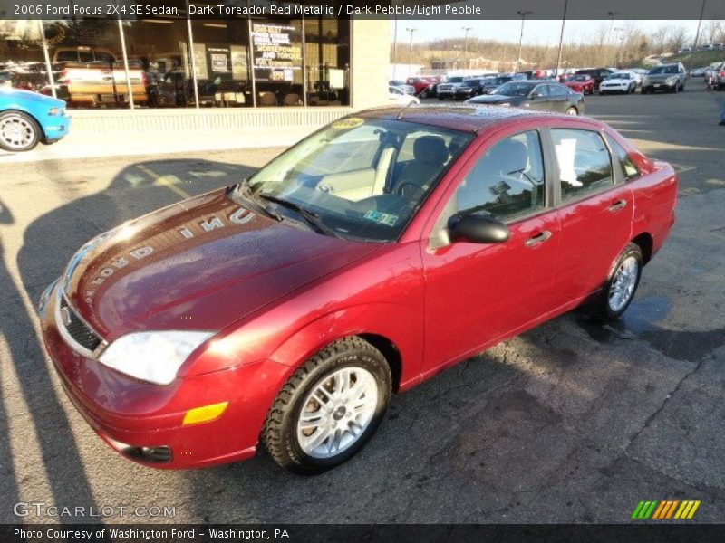 Dark Toreador Red Metallic / Dark Pebble/Light Pebble 2006 Ford Focus ZX4 SE Sedan