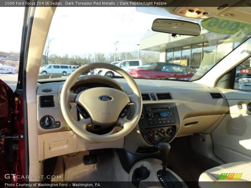 Dark Toreador Red Metallic / Dark Pebble/Light Pebble 2006 Ford Focus ZX4 SE Sedan