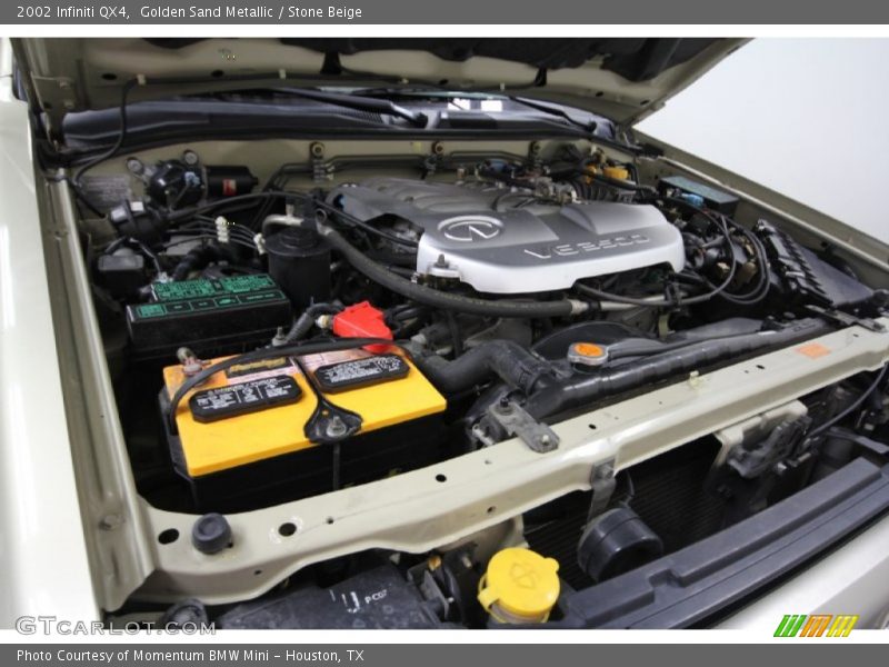 Golden Sand Metallic / Stone Beige 2002 Infiniti QX4