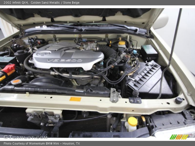 Golden Sand Metallic / Stone Beige 2002 Infiniti QX4