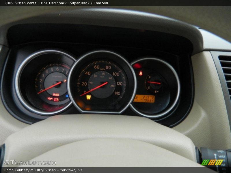 Super Black / Charcoal 2009 Nissan Versa 1.8 SL Hatchback