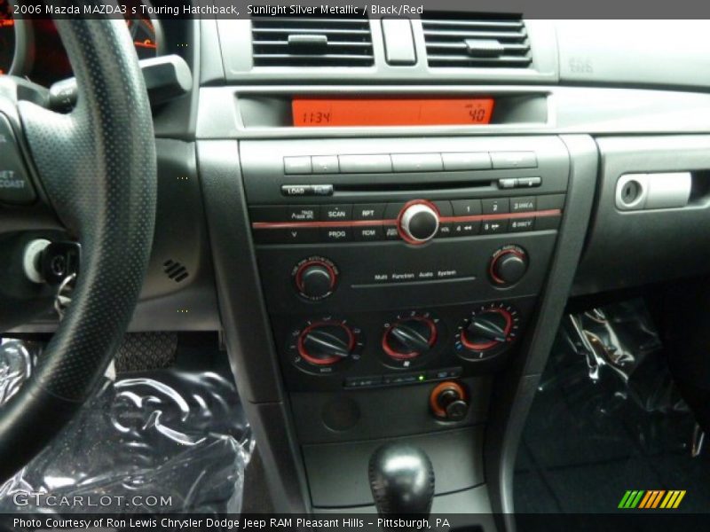 Sunlight Silver Metallic / Black/Red 2006 Mazda MAZDA3 s Touring Hatchback