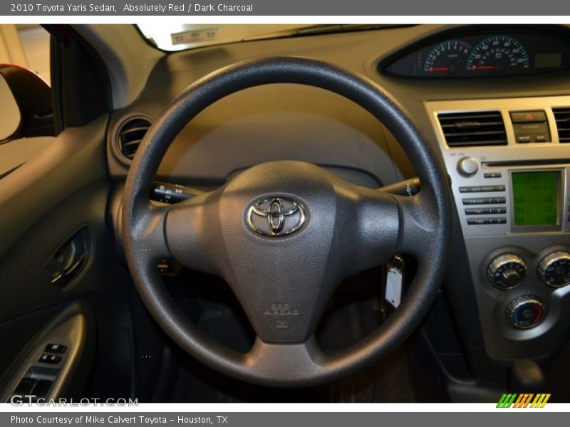 Absolutely Red / Dark Charcoal 2010 Toyota Yaris Sedan