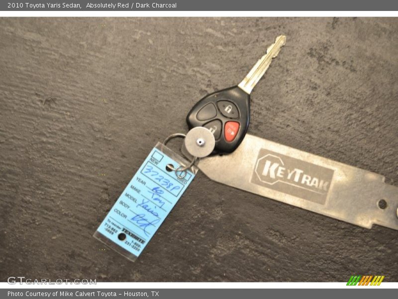 Absolutely Red / Dark Charcoal 2010 Toyota Yaris Sedan