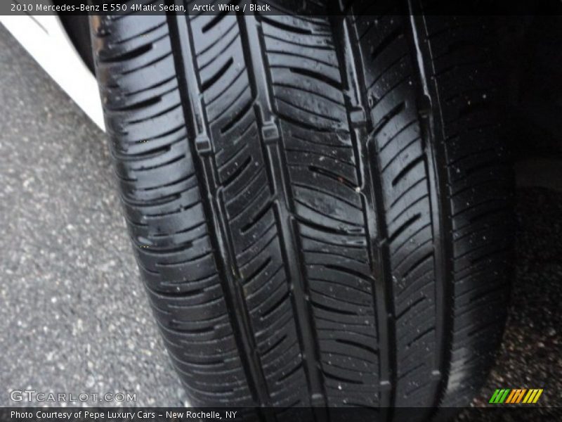 Arctic White / Black 2010 Mercedes-Benz E 550 4Matic Sedan