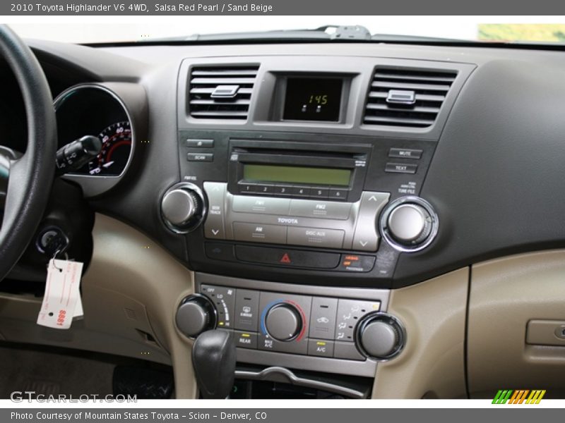 Salsa Red Pearl / Sand Beige 2010 Toyota Highlander V6 4WD