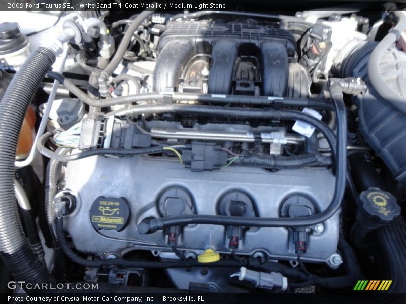 White Sand Tri-Coat Metallic / Medium Light Stone 2009 Ford Taurus SEL