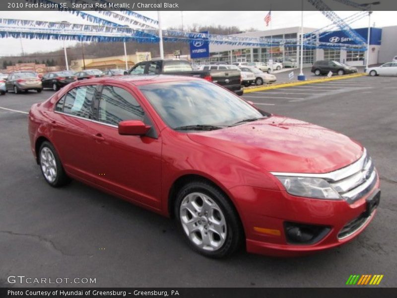 Sangria Red Metallic / Charcoal Black 2010 Ford Fusion SE