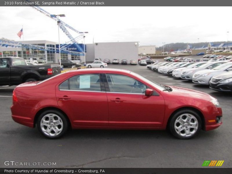 Sangria Red Metallic / Charcoal Black 2010 Ford Fusion SE
