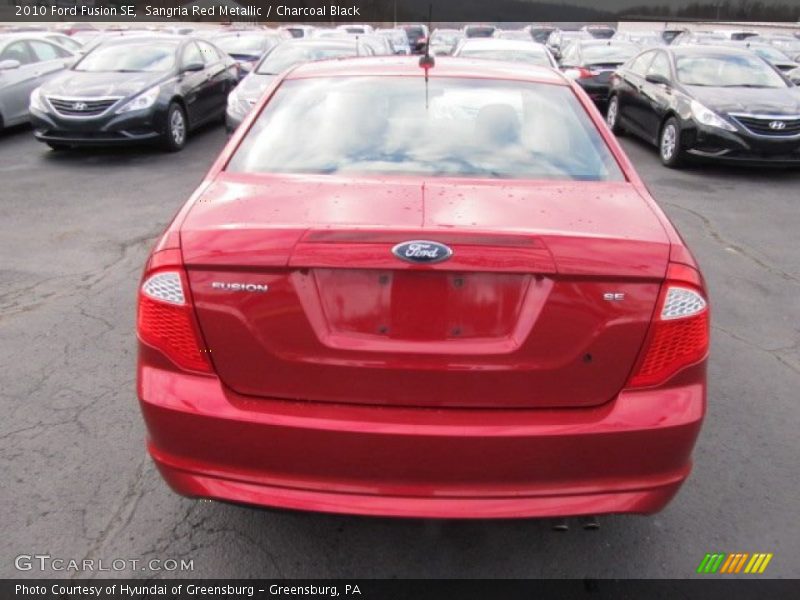 Sangria Red Metallic / Charcoal Black 2010 Ford Fusion SE