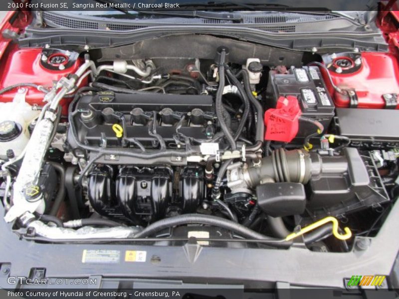 Sangria Red Metallic / Charcoal Black 2010 Ford Fusion SE