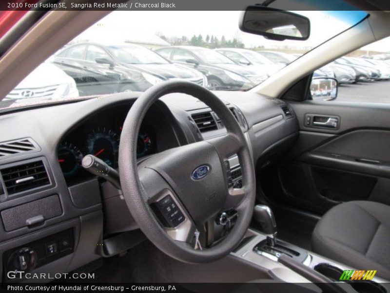 Sangria Red Metallic / Charcoal Black 2010 Ford Fusion SE
