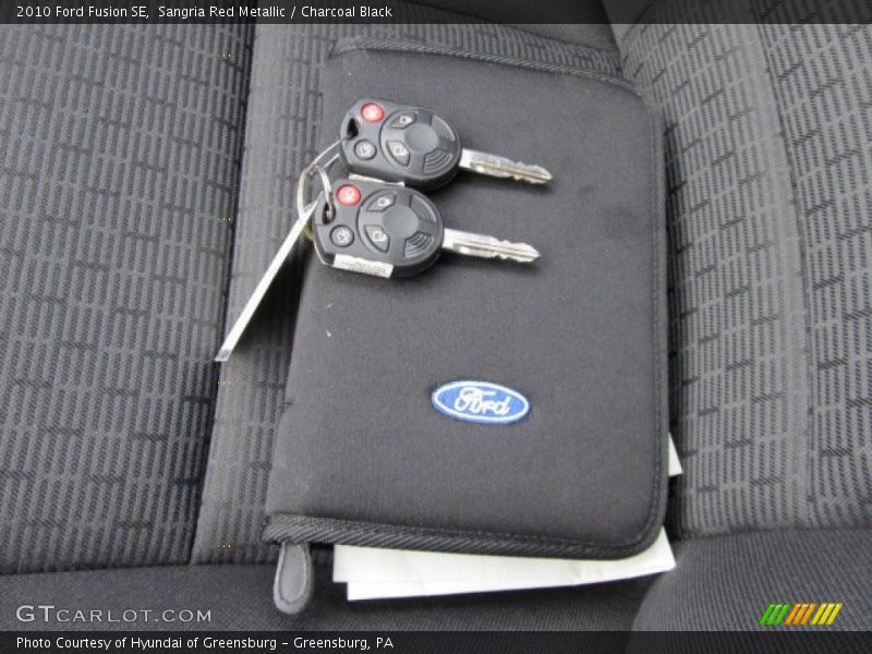 Sangria Red Metallic / Charcoal Black 2010 Ford Fusion SE